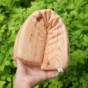 Oreiller en forme de bout de bois
