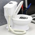 Téléphone en forme de toilettes